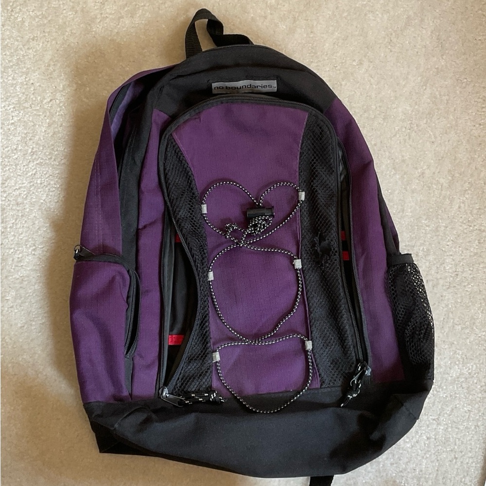 No boundaries purple and black backpack ( never used.) $10